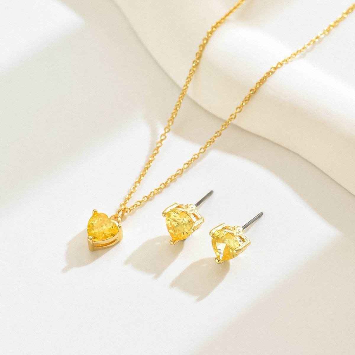 Elegantes Set-Halskette und Ohrstecker mit herzförmigem gelben Kristallanhänger - Kreativkauf.SI