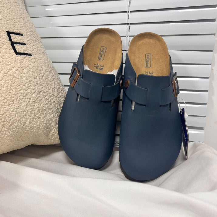 Birkenstock Sandalen aus Leder mit flacher Sohle und anatomischem Fußbett für hohen Tragekomfort - Si.Kreativkauf