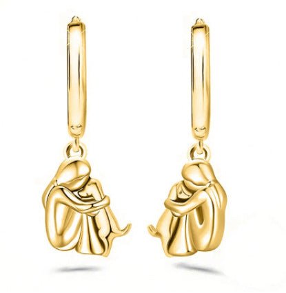 Ein kleines Mädchen und ein Hund umarmen sich - Handgemachte Ohrringe aus Edelstahl für Tierliebhaber - Si.Kreativkauf